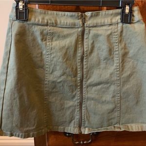 green zip up skirt